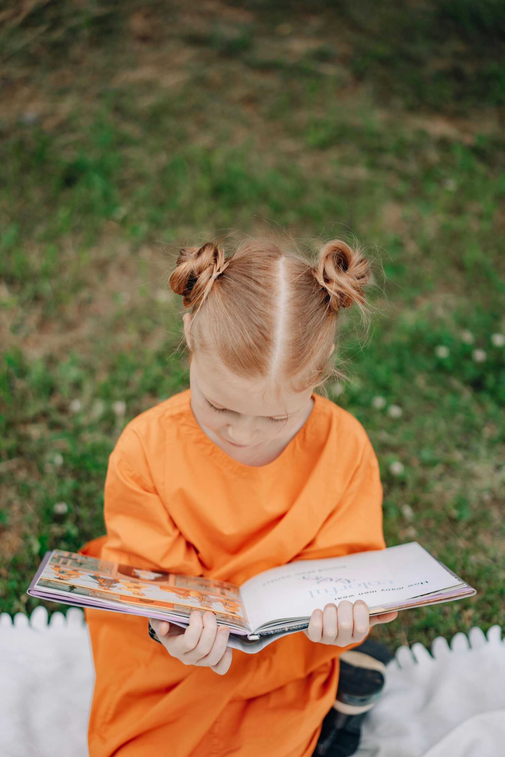 Girl reading personalised story book