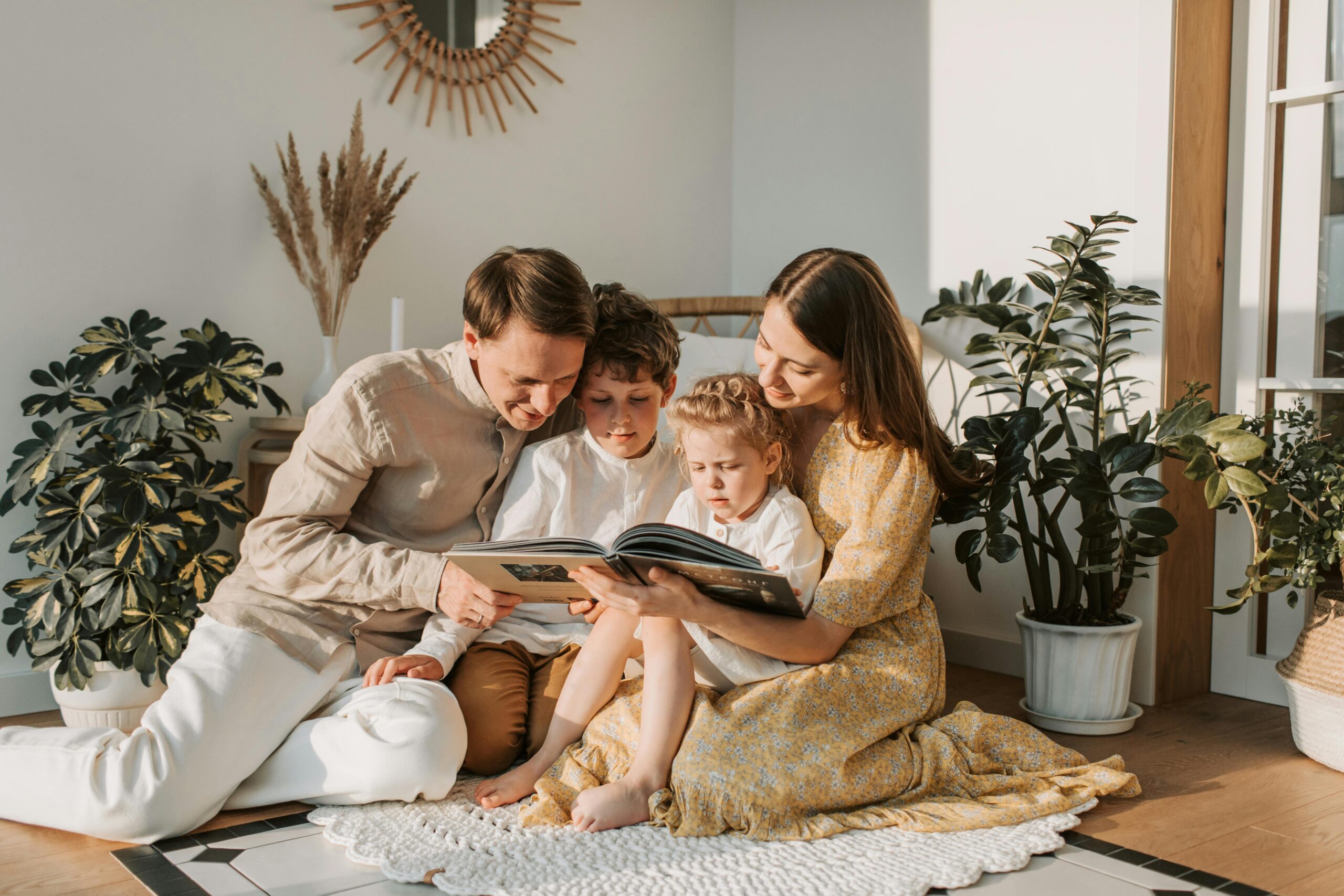 parents reading personalised book with kid